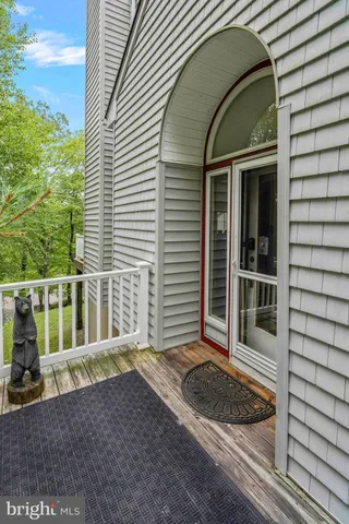 a view of a bathroom with a glass door