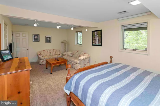 a view of balcony with wooden floor and outdoor seating