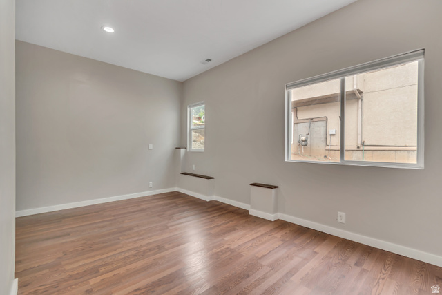 2154 Wasatch Boulevard Sandy, UT 84092 - Photo 50 of 55 Empty room featuring light wood-style floors and recessed lighting