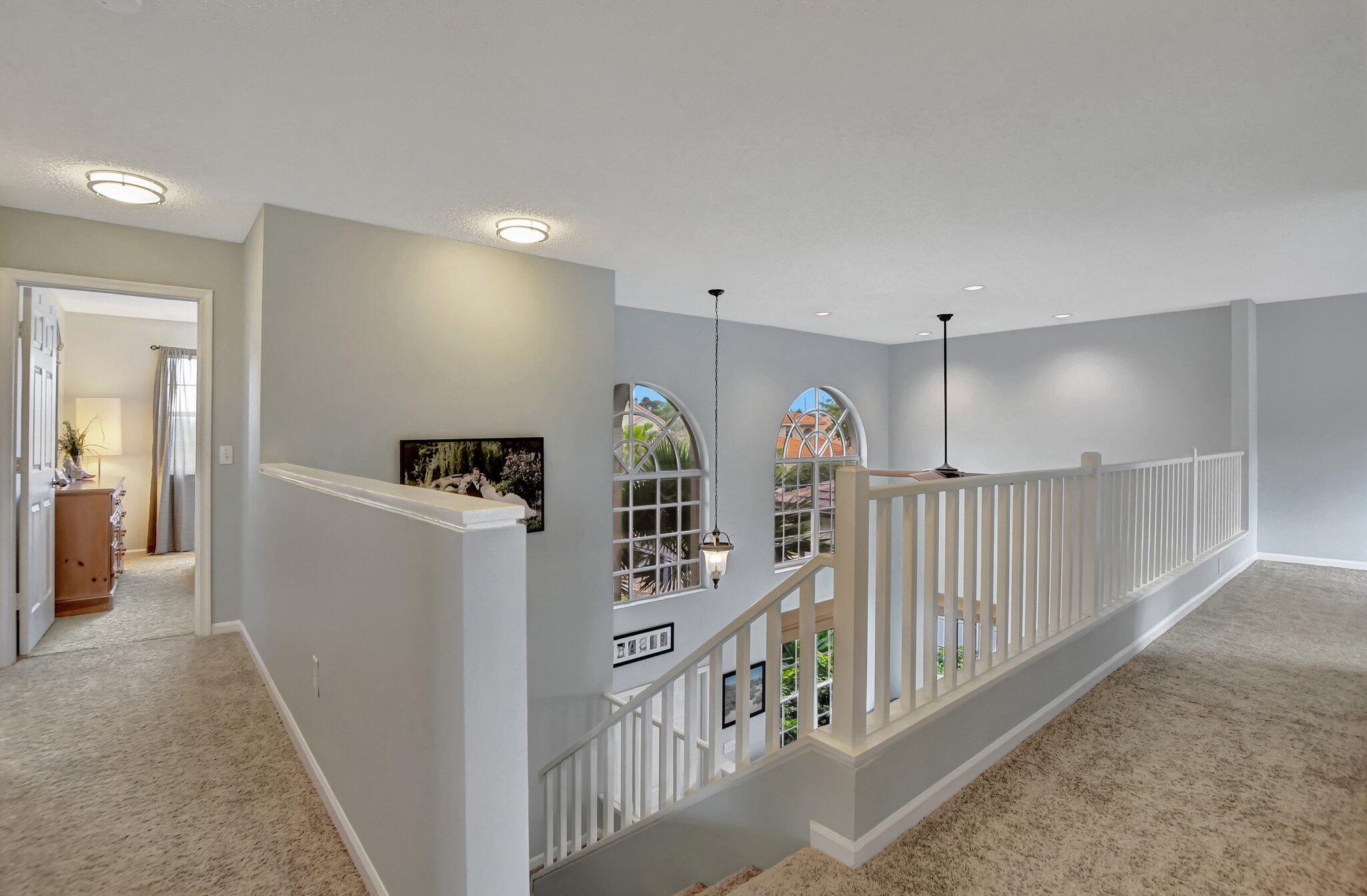 18498 East Covington Trace Boca Raton, FL 33498 - Photo 28 of 62 a view of a hallway with workspace