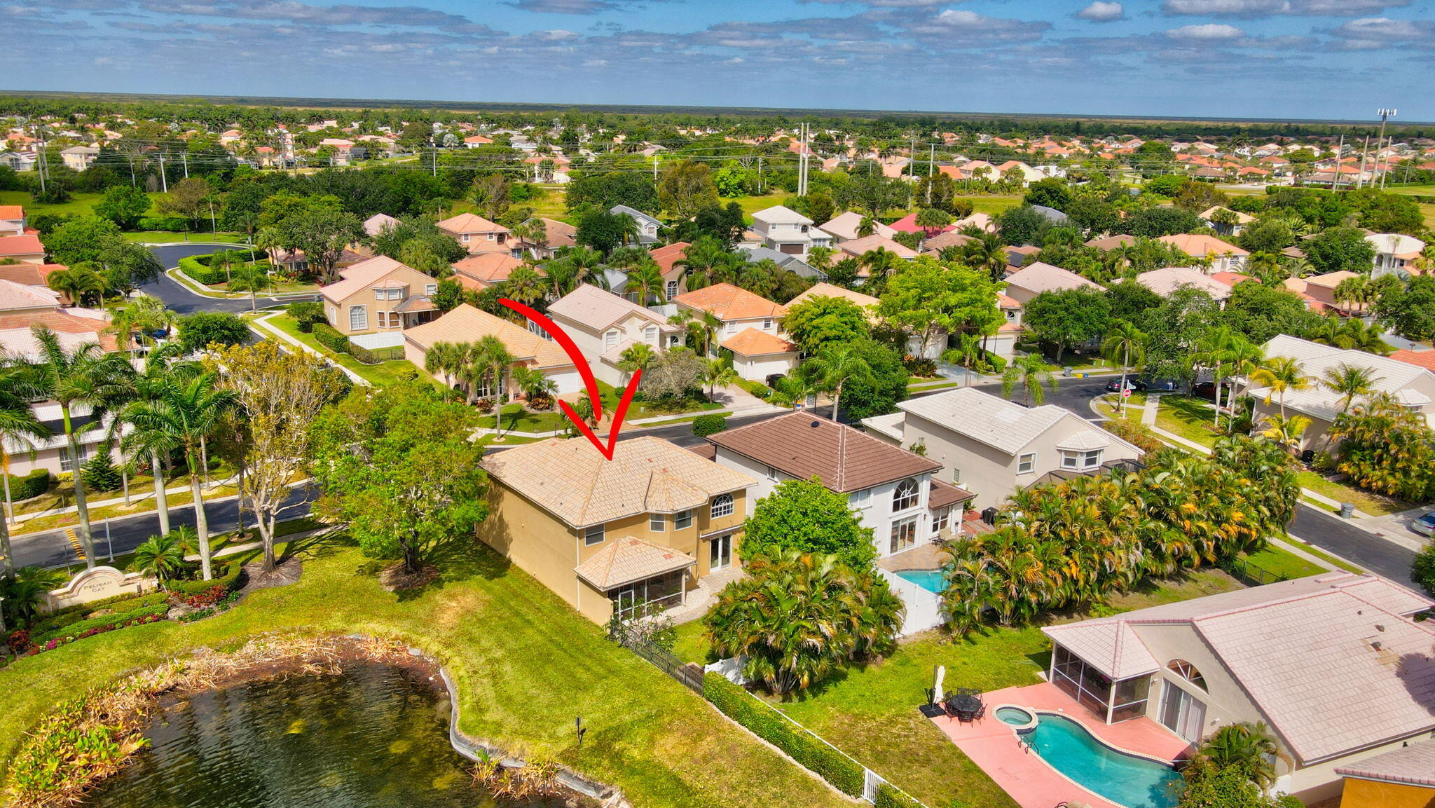 18498 East Covington Trace Boca Raton, FL 33498 - Photo 61 of 62 an aerial view of residential house with swimming pool and outdoor space