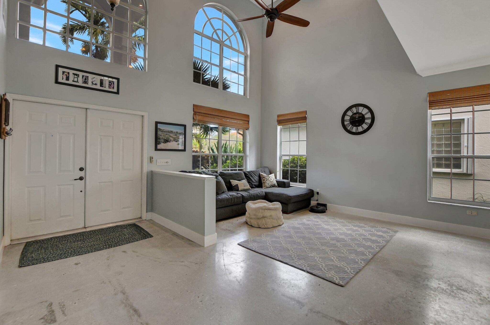 18498 East Covington Trace Boca Raton, FL 33498 - Photo 7 of 62 a living room with furniture and a window