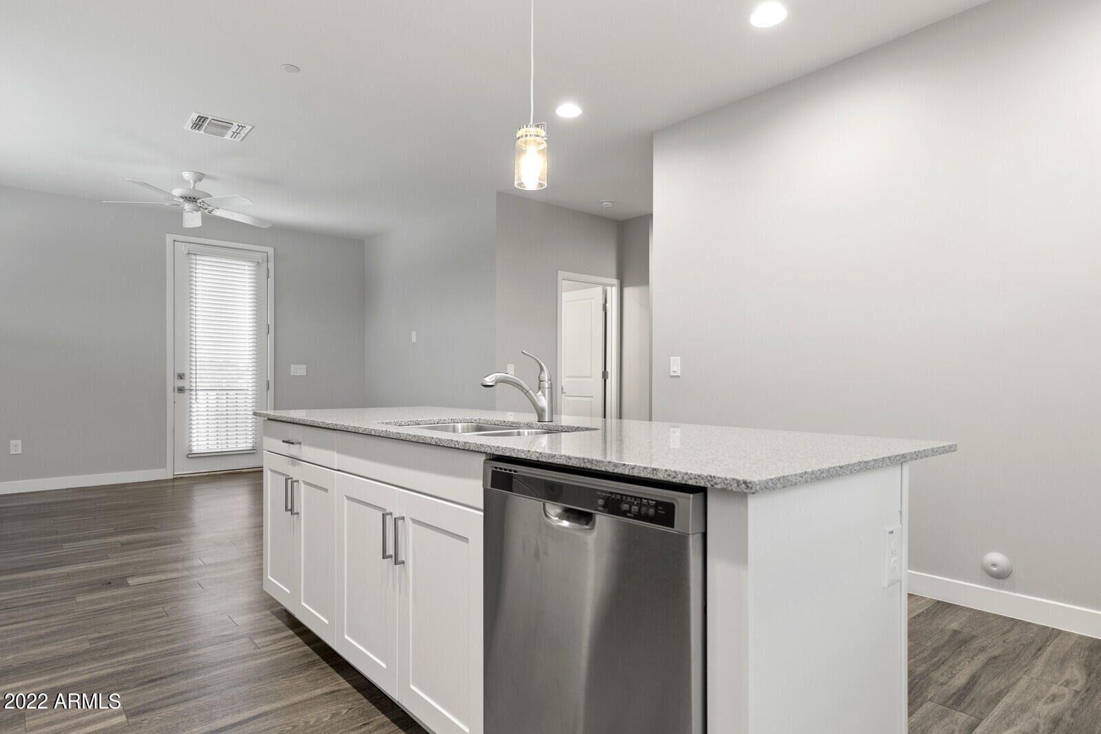 2245 North Dayton Street, Unit 4 Phoenix, AZ 85006 - Photo 9 of 28 a kitchen with a sink and a refrigerator