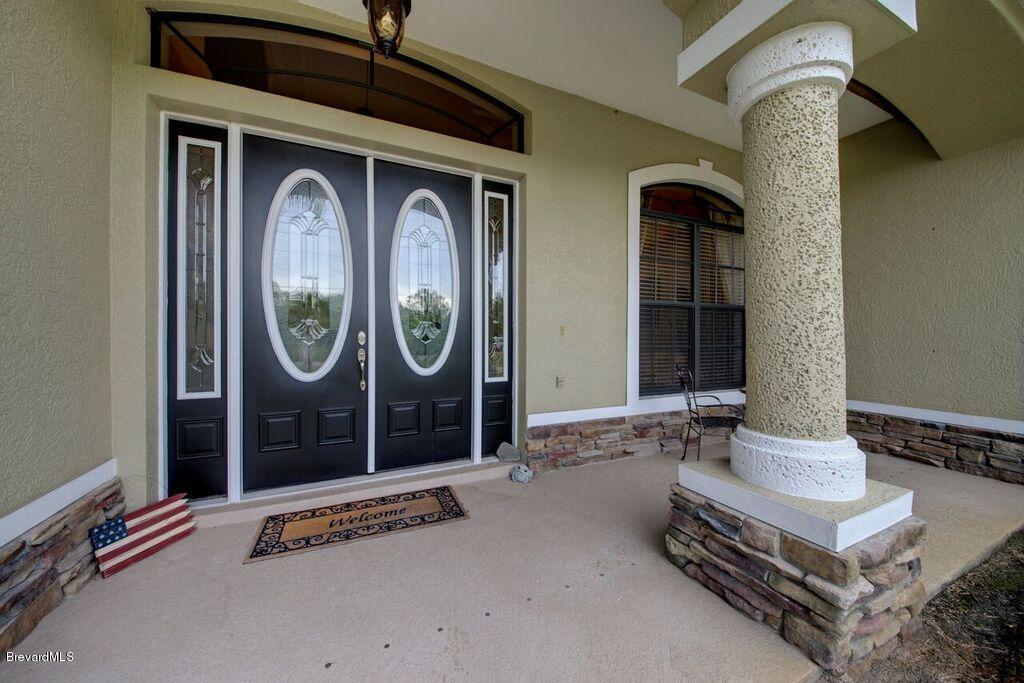 3955 Harlock Road Melbourne, FL 32934 - Photo 2 of 63 Front view entrance