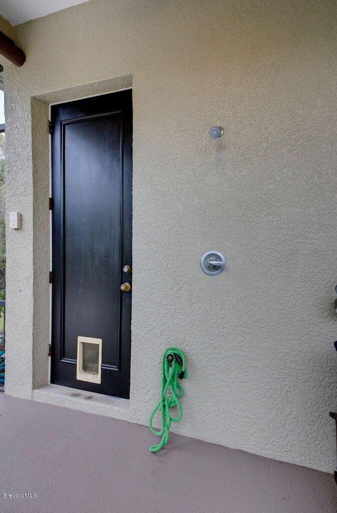 3955 Harlock Road Melbourne, FL 32934 - Photo 54 of 63 Pool area shower