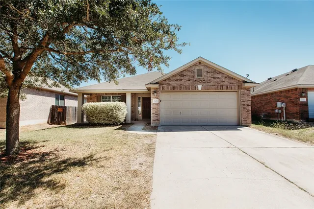 a front view of house with yard