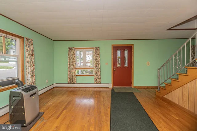 a kitchen with stainless steel appliances granite countertop a stove a sink dishwasher and a refrigerator