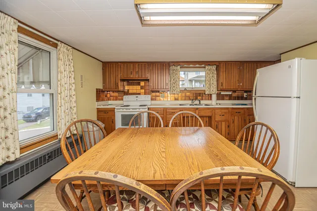 a view of a room with wooden walls