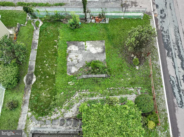 a view of a garden from a balcony
