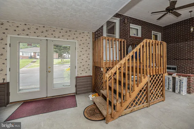 a bathroom with a sink mirror and toilet