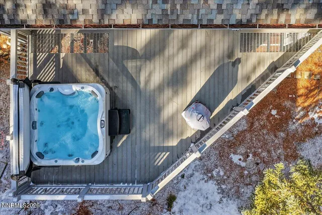 a room with gym equipment and large mirror