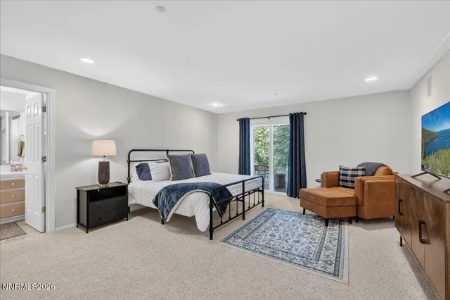 a bathroom with a sink a shower and a mirror
