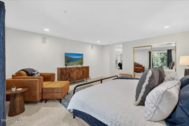 a room with stainless steel appliances lots of counter space and a table