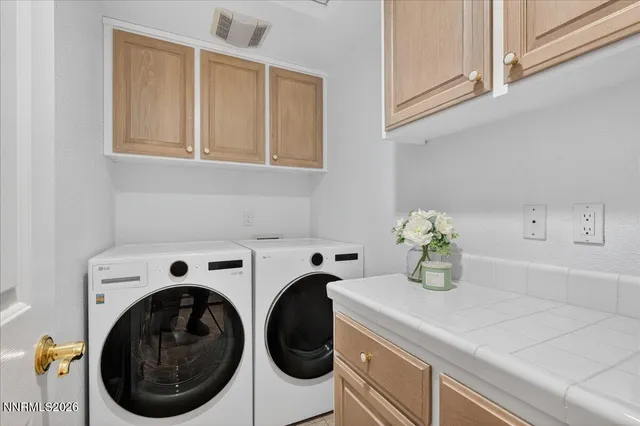 a view of a house with a yard and garden