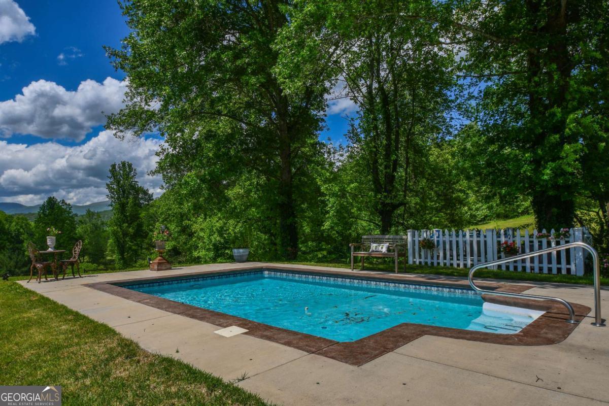 708 Hub Tatum Road Sautee Nacoochee, GA 30571 - Photo 16 of 100 a view of a backyard with a small pool