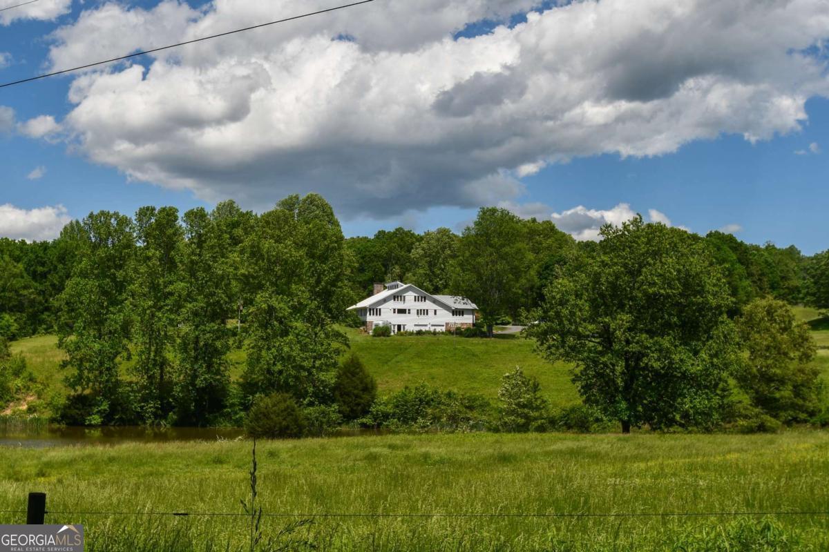 708 Hub Tatum Road Sautee Nacoochee, GA 30571 - Photo 3 of 100 a view of a big yard