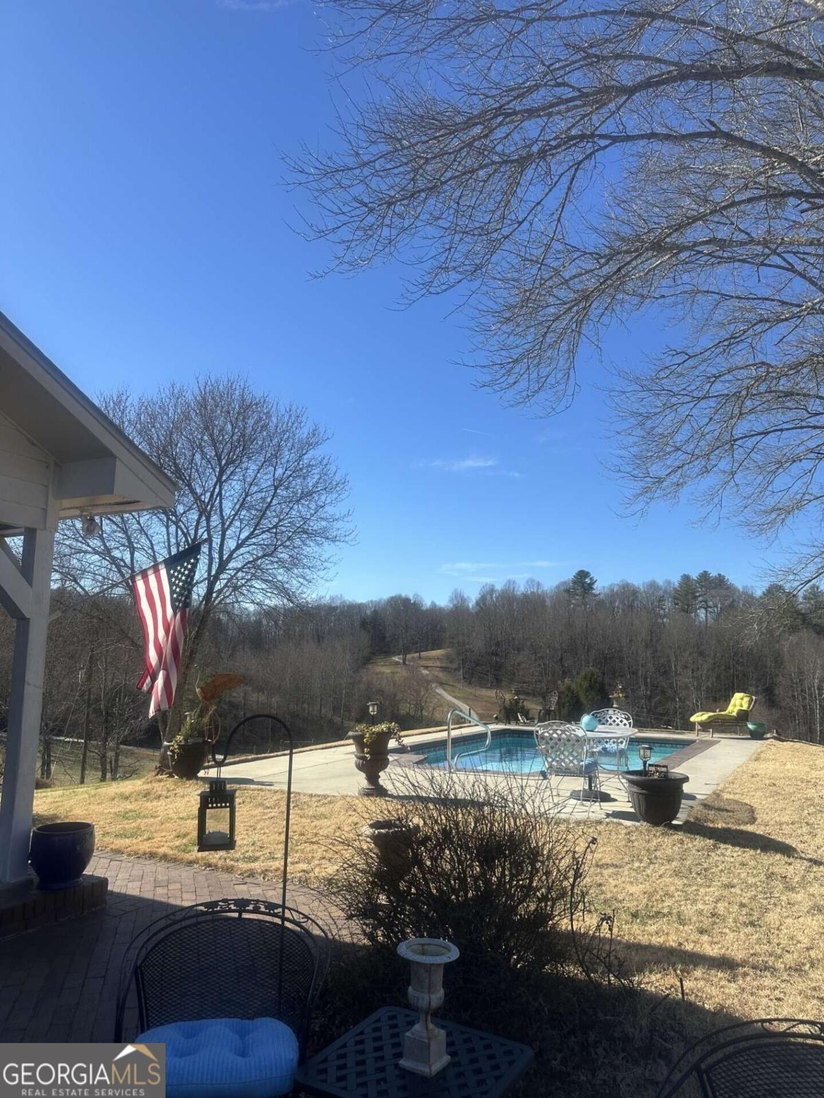 708 Hub Tatum Road Sautee Nacoochee, GA 30571 - Photo 35 of 100 a view of a lake with a mountain