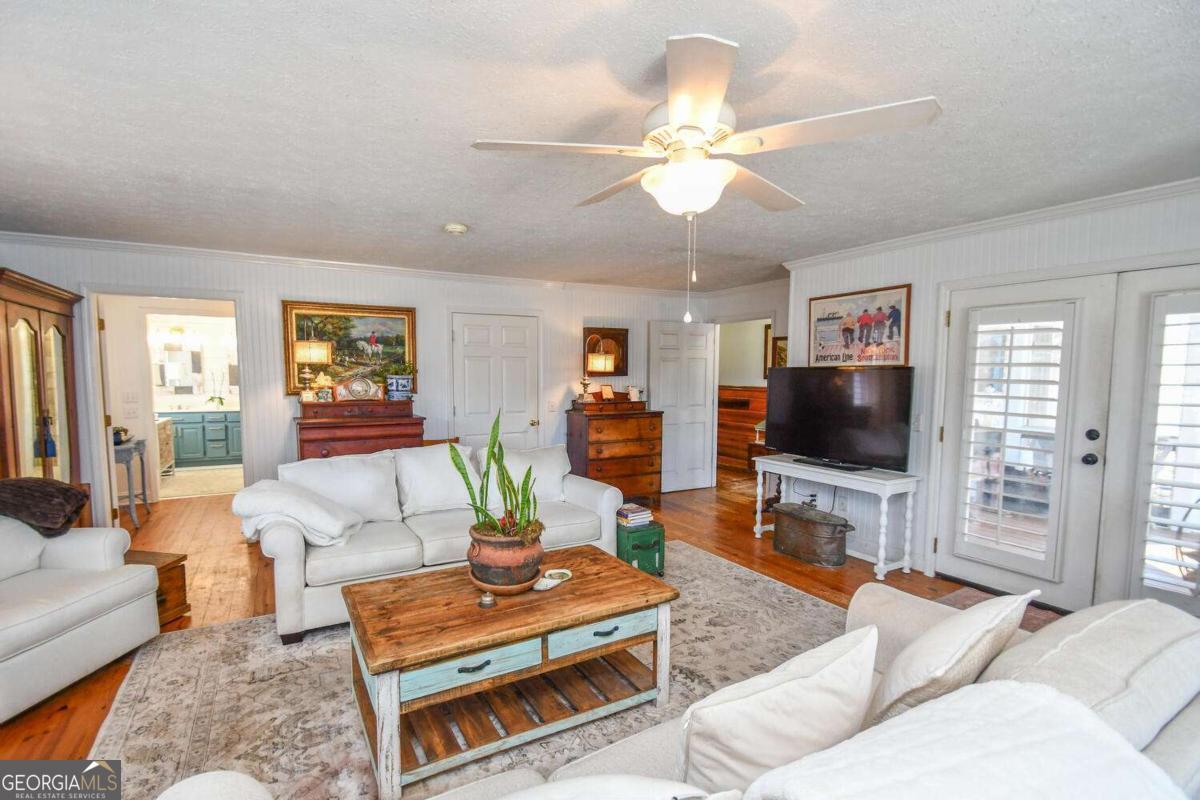 708 Hub Tatum Road Sautee Nacoochee, GA 30571 - Photo 36 of 100 a living room with furniture and a flat screen tv