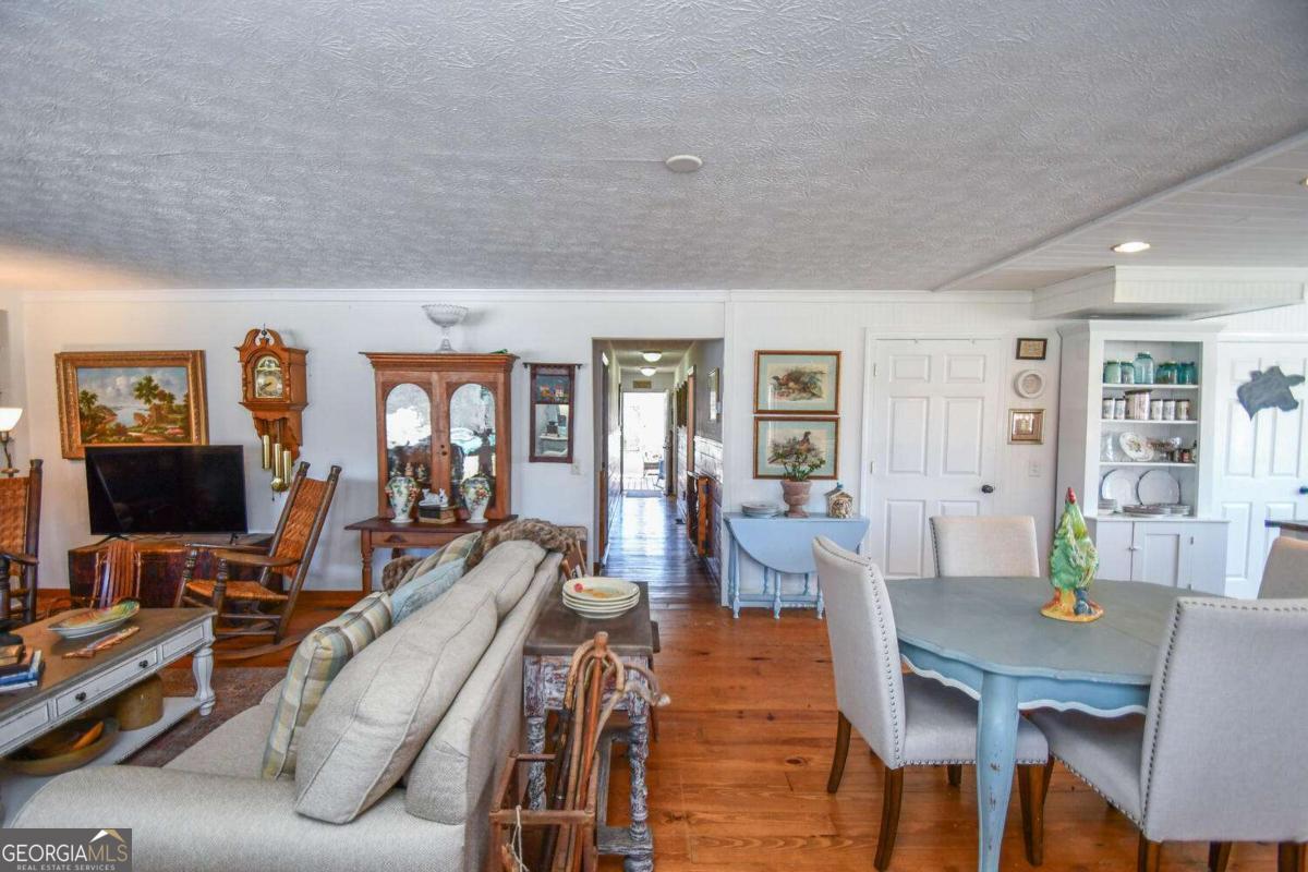 708 Hub Tatum Road Sautee Nacoochee, GA 30571 - Photo 43 of 100 a living room with furniture and a flat screen tv