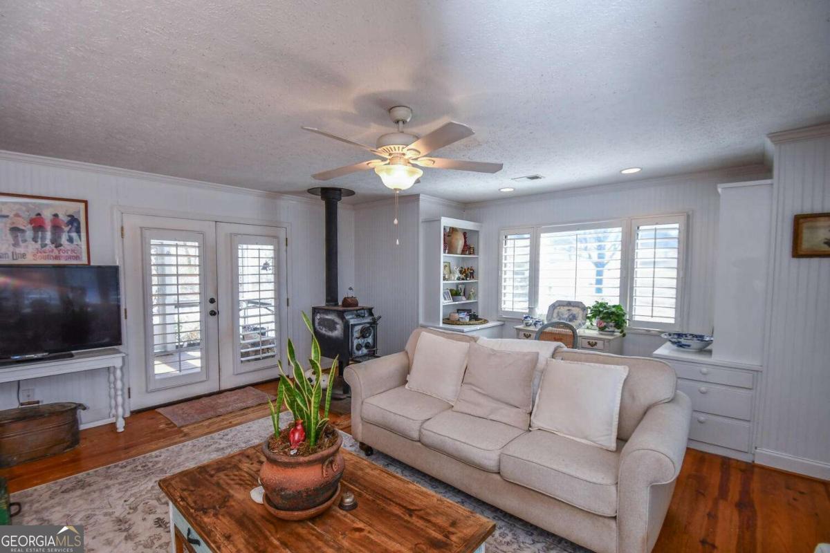 708 Hub Tatum Road Sautee Nacoochee, GA 30571 - Photo 48 of 100 a living room with furniture and a flat screen tv