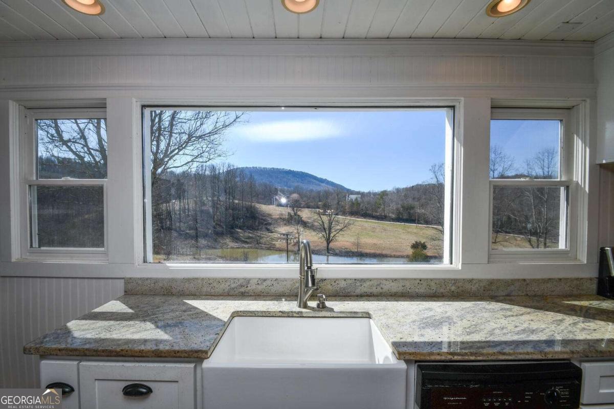 708 Hub Tatum Road Sautee Nacoochee, GA 30571 - Photo 57 of 100 a bathroom with a sink and a window