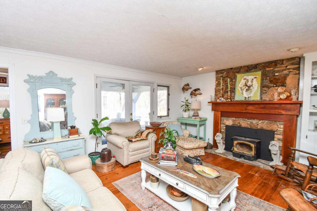 708 Hub Tatum Road Sautee Nacoochee, GA 30571 - Photo 71 of 100 a living room with furniture and a fireplace