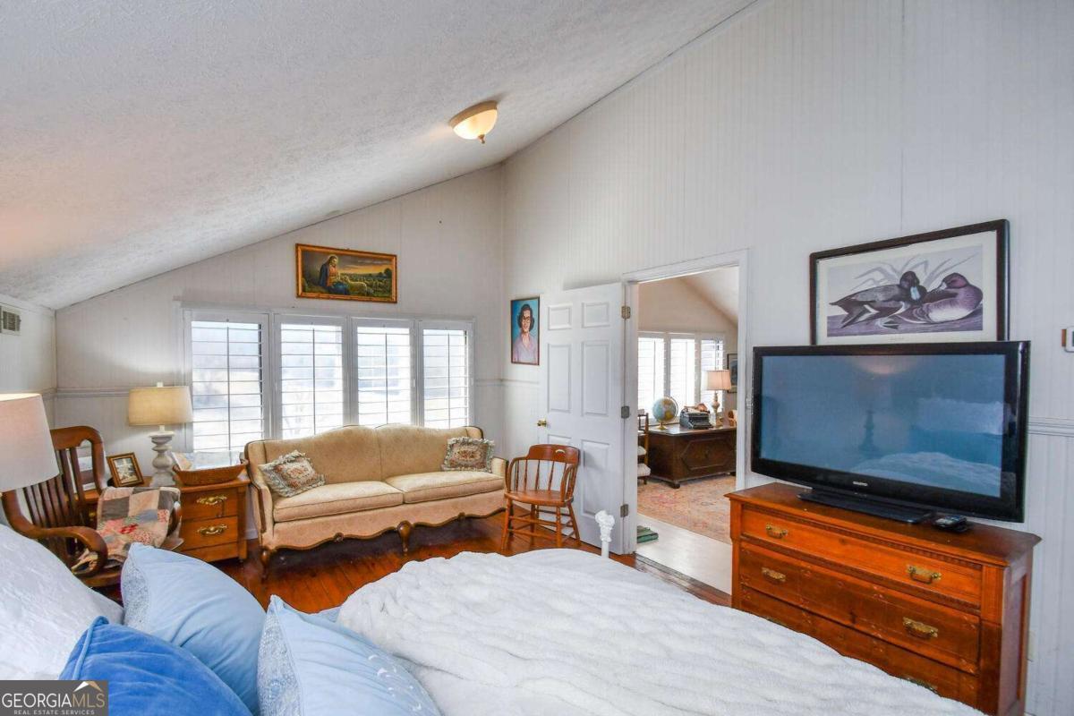 708 Hub Tatum Road Sautee Nacoochee, GA 30571 - Photo 81 of 100 a living room with furniture and a flat screen tv