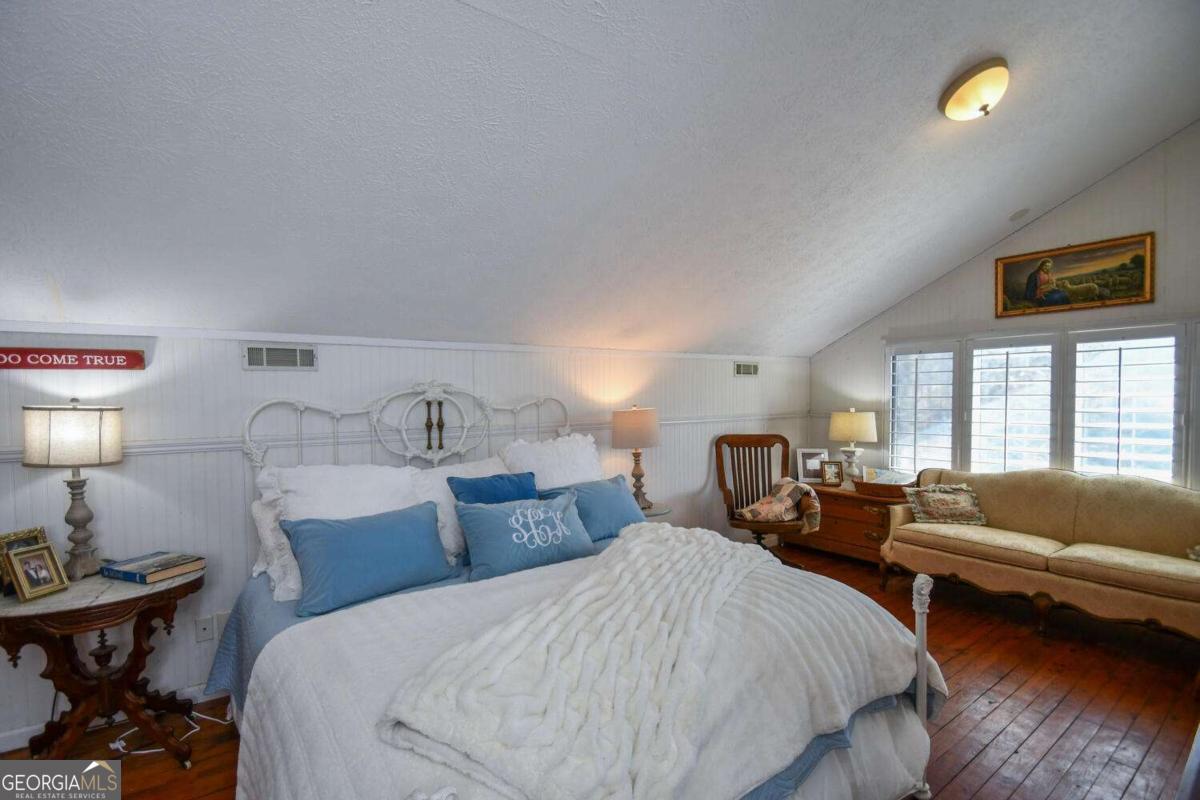 708 Hub Tatum Road Sautee Nacoochee, GA 30571 - Photo 85 of 100 a bed room with two bed and a couch