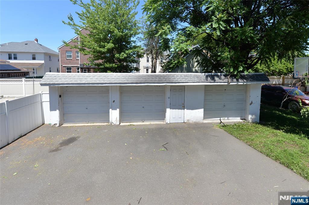 62 Broadway, Unit 1 Hackensack, NJ 07601 - Photo 21 of 25 front view of a house with a garage