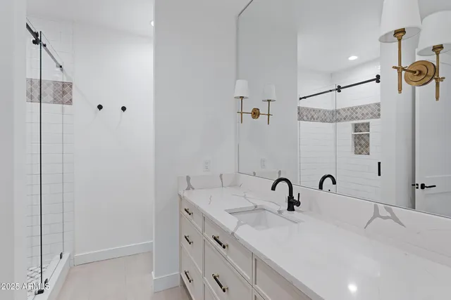 a bath tub sitting in a bathroom next to a window