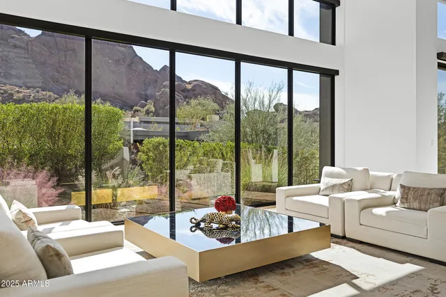 a living room with couch and a window