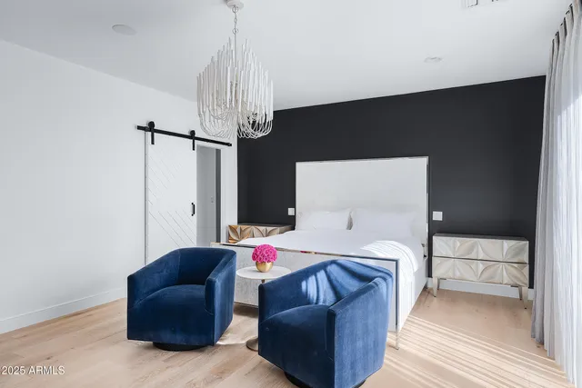 a view of a terrace with furniture and city view