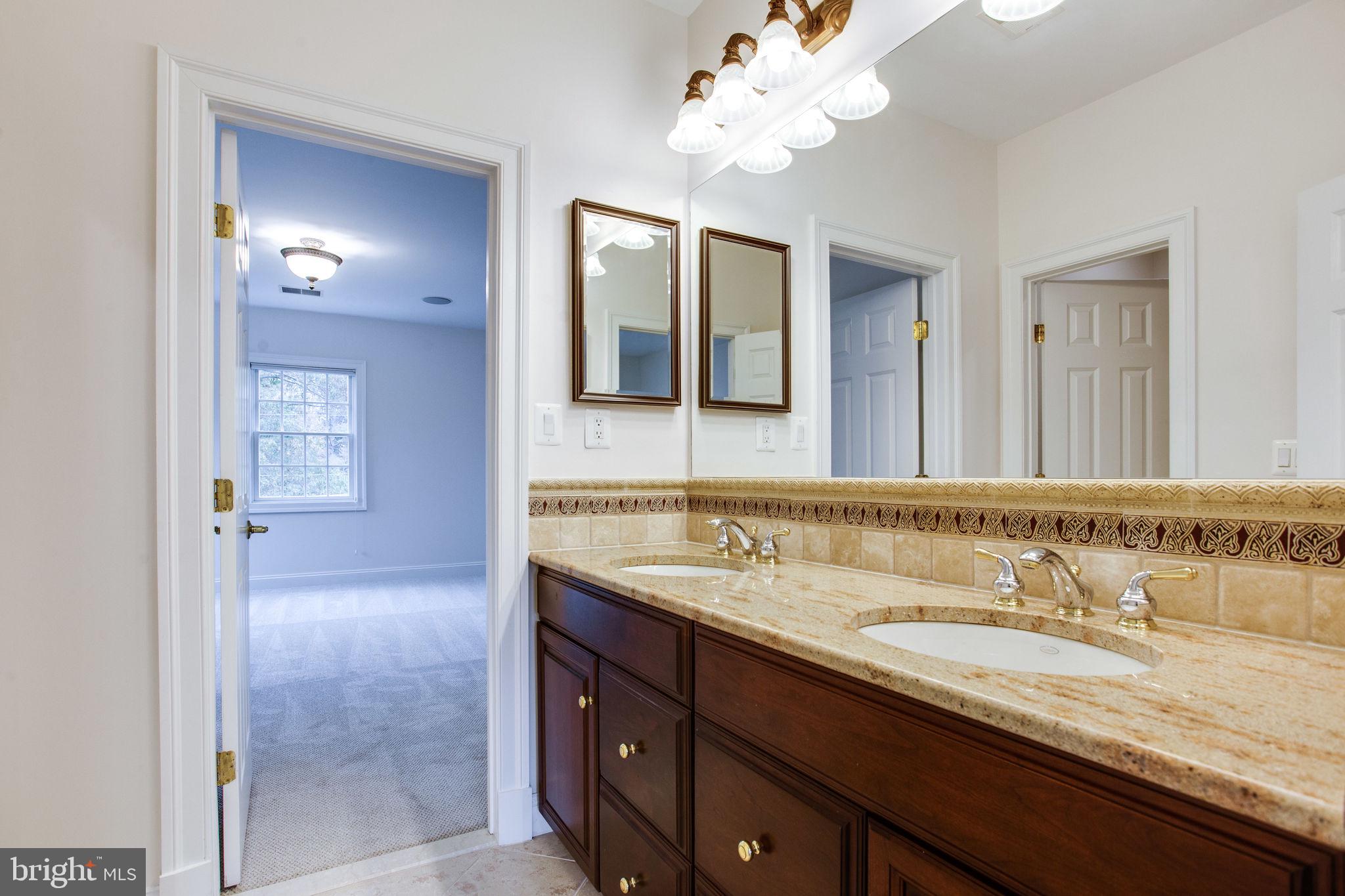 10301 Dunfries Road Vienna, VA 22181 - Photo 67 of 106 Upstairs Jack and Jill Bathroom