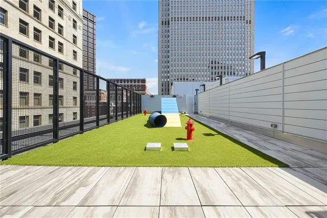 a view of a swimming pool with a lounge chairs