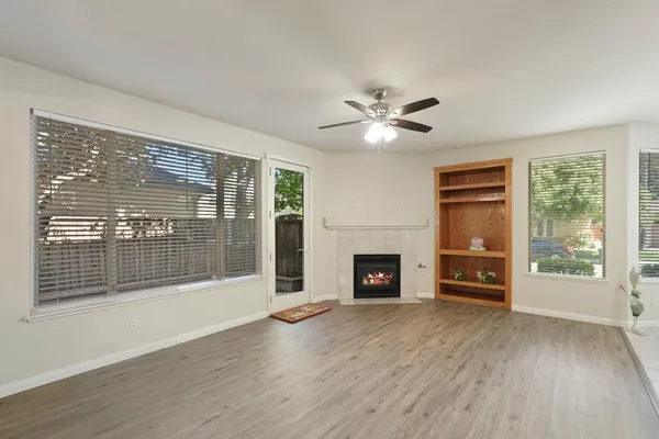 a view of livingroom with furniture and wooden floor