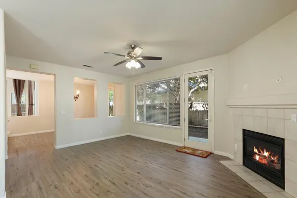 a bedroom with a bed couch and window