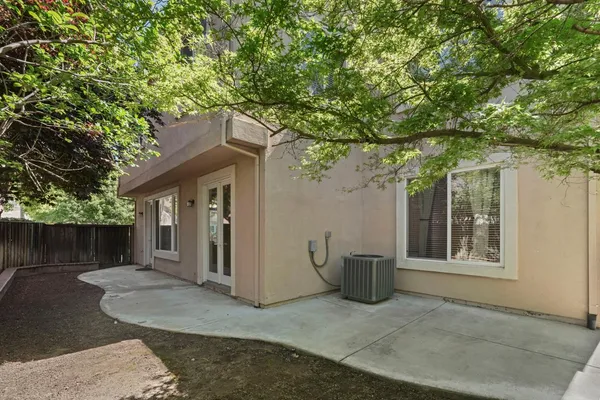 a backyard of a house with lots of green space