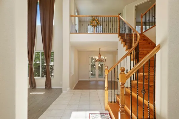 a kitchen with granite countertop a sink and a window