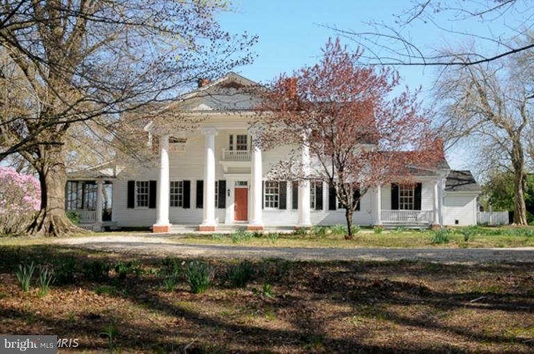 1059 Cumberstone Road Harwood, MD 20776 - Photo 1 of 26 a front view of a house with garden