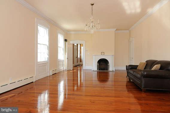 1059 Cumberstone Road Harwood, MD 20776 - Photo 13 of 26 a living room with furniture and a fireplace