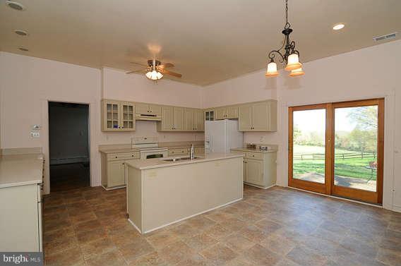 1059 Cumberstone Road Harwood, MD 20776 - Photo 16 of 26 a kitchen with stove and refrigerator