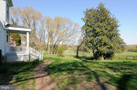 1059 Cumberstone Road Harwood, MD 20776 - Photo 20 of 26 a view of a house with a yard