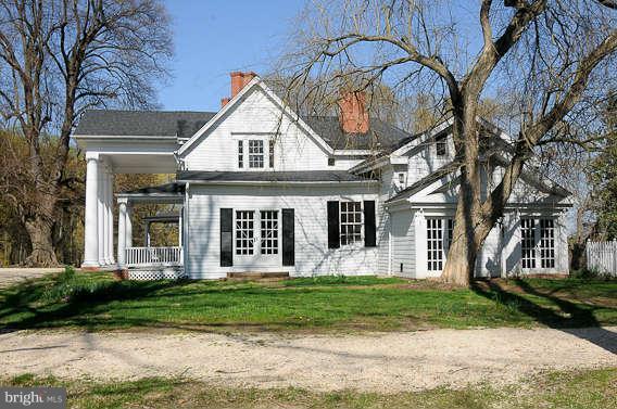 1059 Cumberstone Road Harwood, MD 20776 - Photo 3 of 26 a front view of a house with a yard
