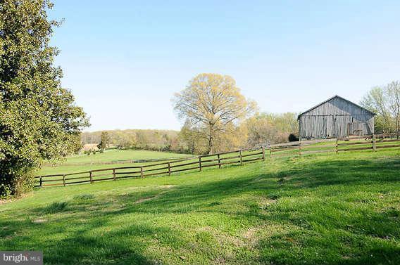 1059 Cumberstone Road Harwood, MD 20776 - Photo 21 of 26 a view of an house with backyard and outdoor space