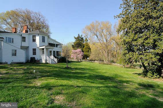 1059 Cumberstone Road Harwood, MD 20776 - Photo 22 of 26 a view of a house with a big yard