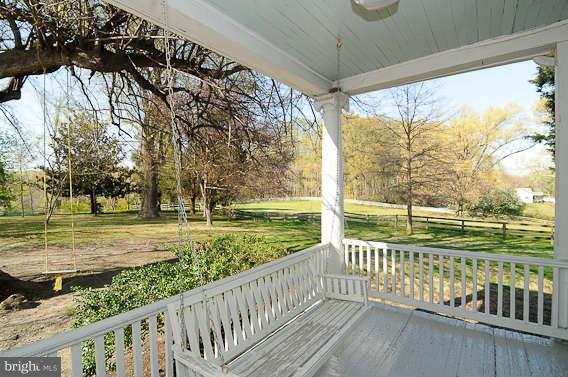 1059 Cumberstone Road Harwood, MD 20776 - Photo 25 of 26 a view of a yard with wooden floor