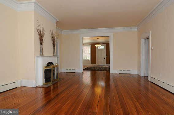 1059 Cumberstone Road Harwood, MD 20776 - Photo 9 of 26 wooden floor in an empty room