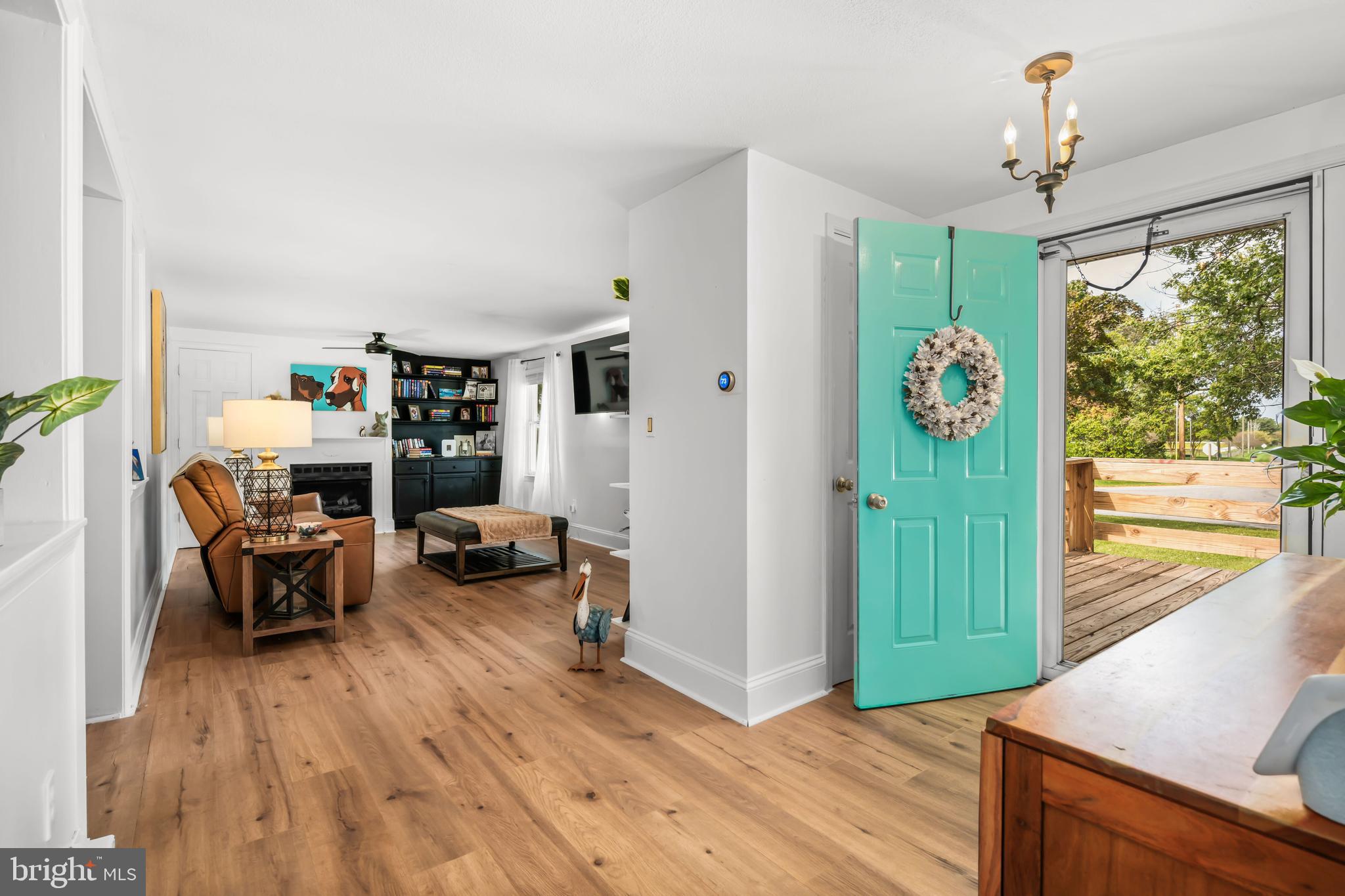 7653 Broad Neck Road Chestertown, MD 21620 - Photo 14 of 39 a living room with furniture and a large window