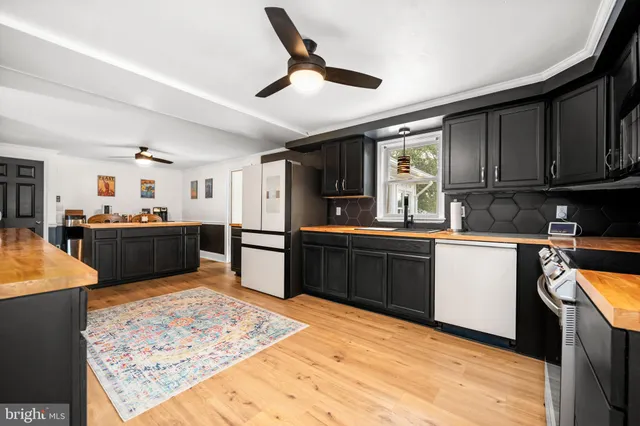 a view of a dining table and chairs in a room