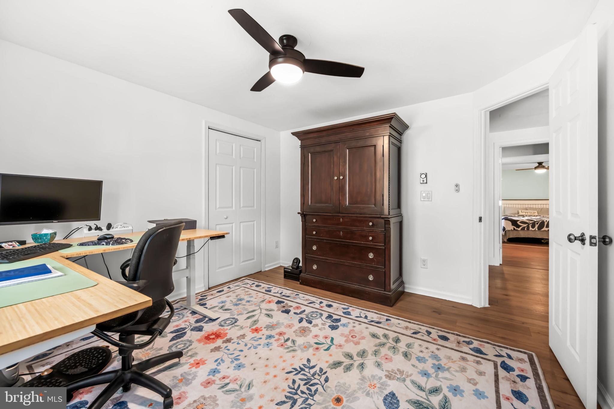 7653 Broad Neck Road Chestertown, MD 21620 - Photo 28 of 39 a bedroom with a bed and a chair